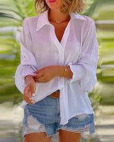 Enfärgad blus med långa ärmar